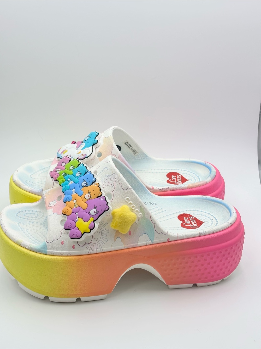 CROCS Care Bears Stomp Slide Pastel Sandals in Yellow, Pink, Blu size W5/M3